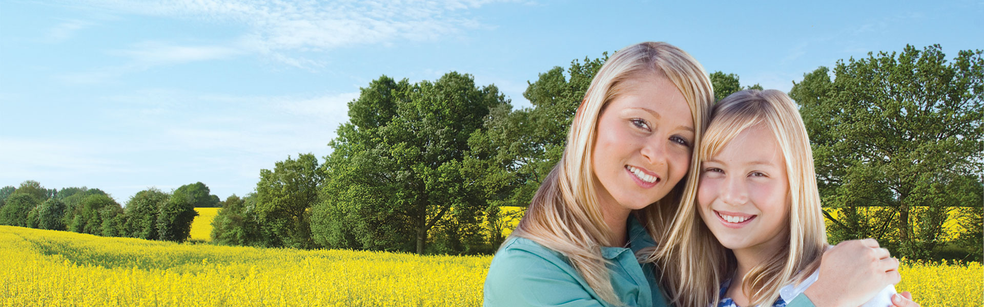 mother and daughter in a field